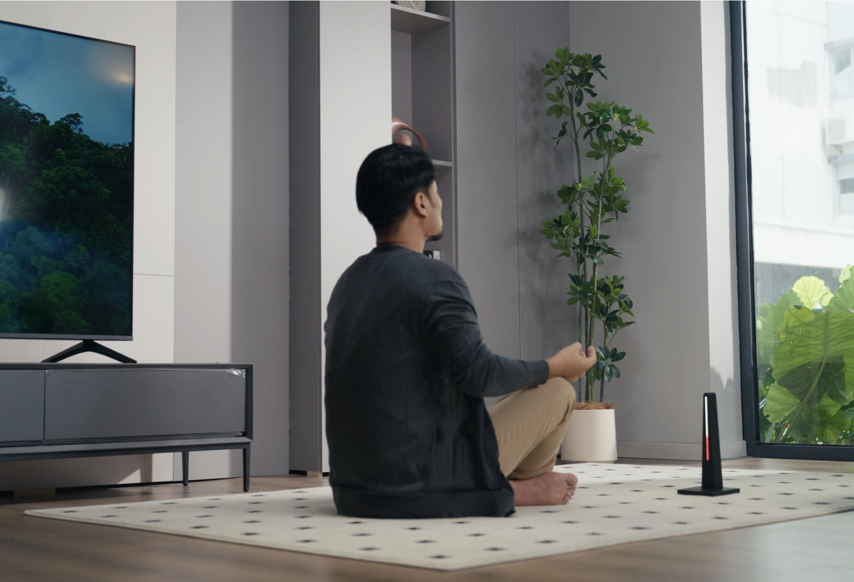 Timer beside a person meditating