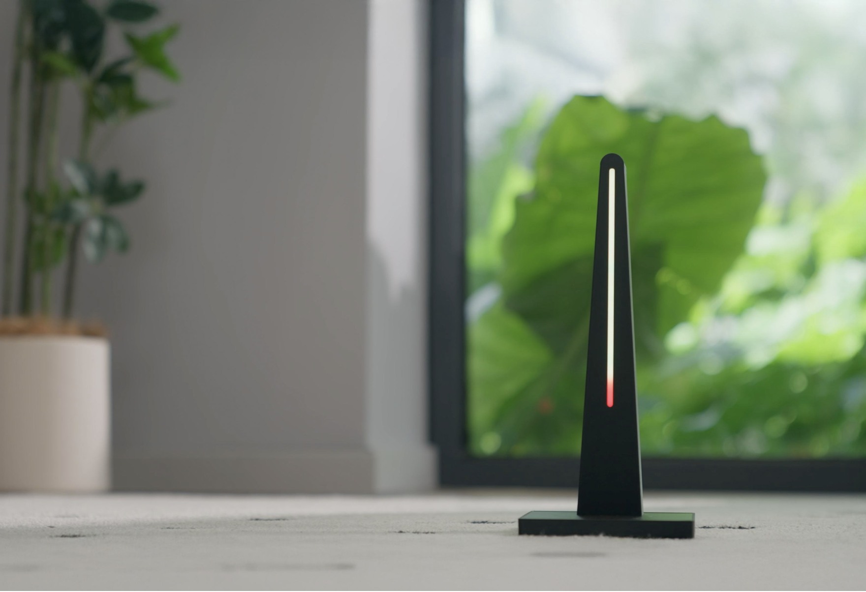 Incense Timer glowing beside a window